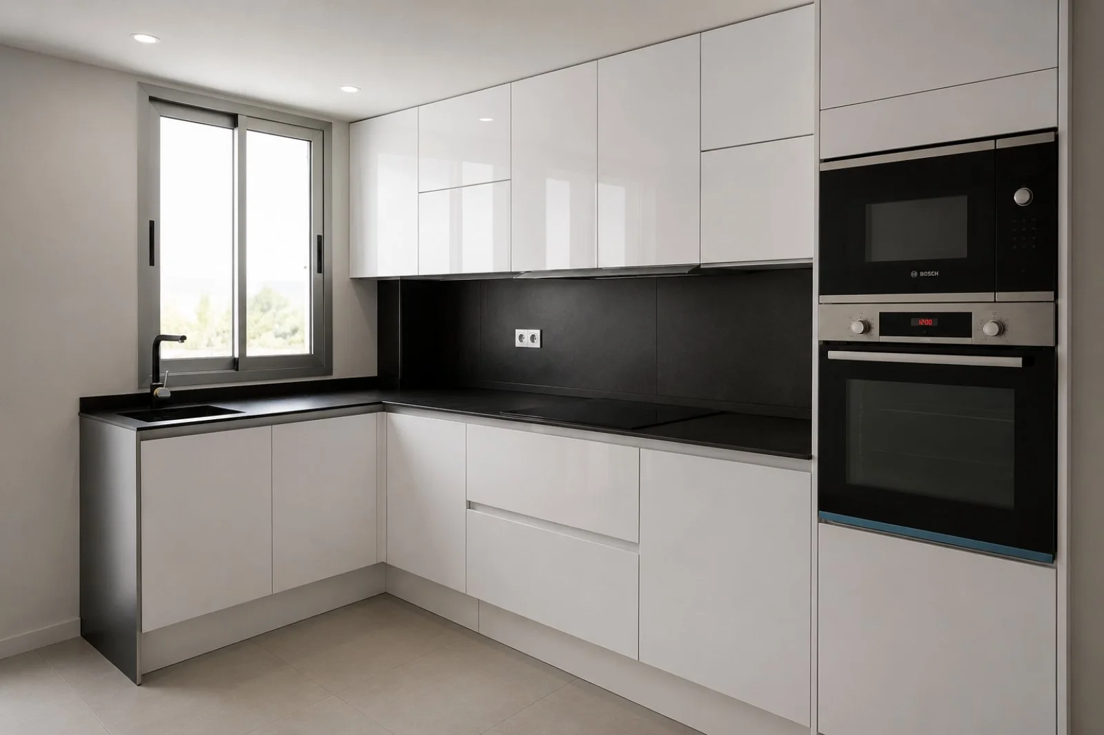 Cocina de Casa Yin Yang con frentes blancos y encimera negra